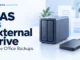 Ryvenora Insights cover reading NAS vs External Drive, Home Office Backups, with a stylized two-bay NAS and portable external drive on a pale blue background.